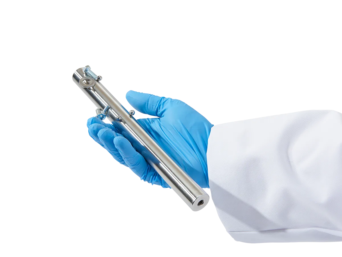 Magnetic tube holding captured ferrous particles