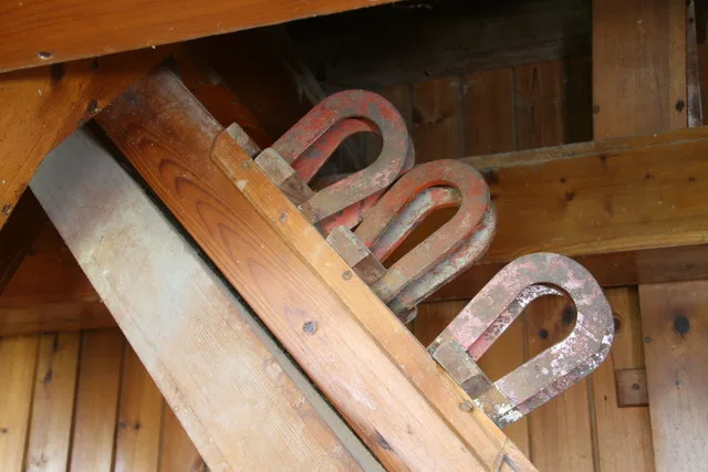 Traditional horseshoe magnetic separator in a flour mill chute